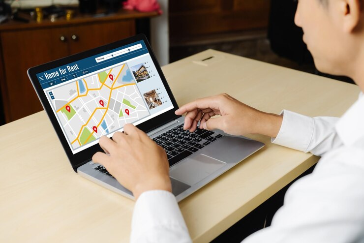 Photo online real estate rental search snugly on computer