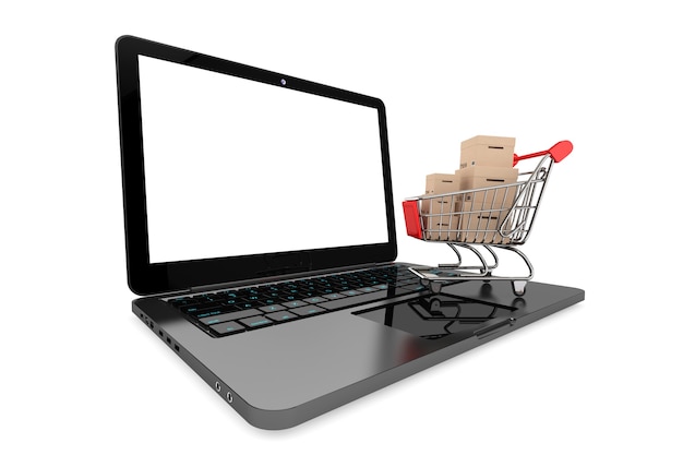 Photo online shopping concept. shopping cart with boxes over laptop on a white background