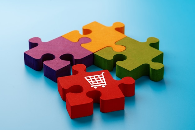 Online shopping icon on colorful jigsaw puzzle