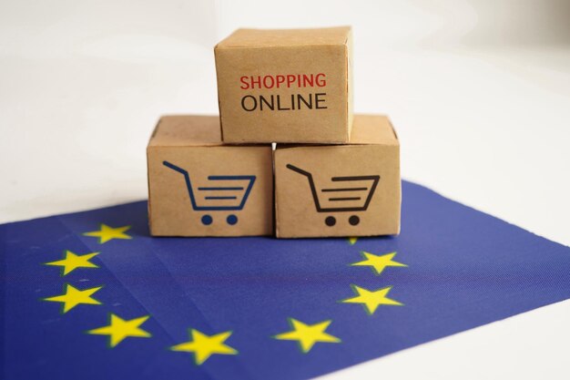 Online shopping Shopping cart box on EU flag import export finance commerce