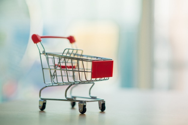 Online shopping through a shopping cart. - Image