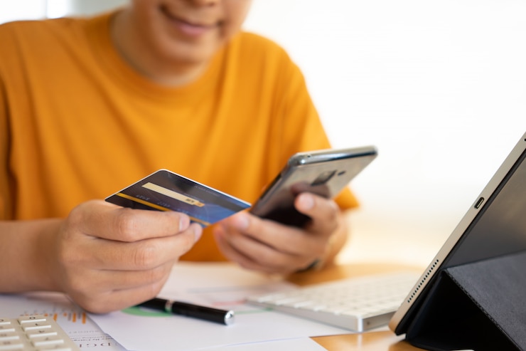 Photo online shopping with smartphone and credit card