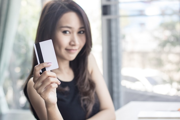 online shopping women holding credit card