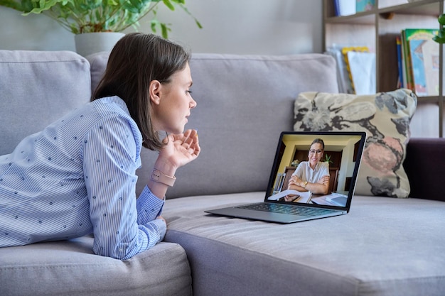 Photo online therapy meeting of young woman with psychologist