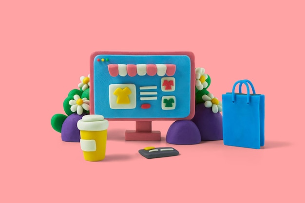 Online winkel met computer handgemaakt in plasticine