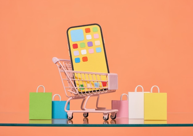 Online winkelen idee Een telefoon een winkelwagentje en kleurrijke pakketten