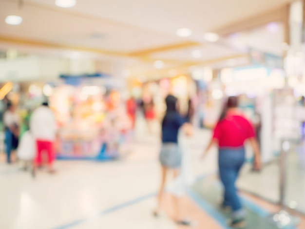 Onscherpe achtergrond. mensen bij winkelcentrum wazig achtergrond met bokeh en vintage afgezwakt.