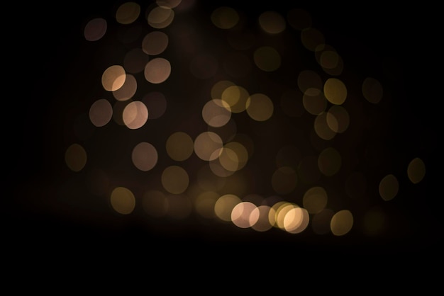 Ontfocusd beeld van verlichte lichten's nachts