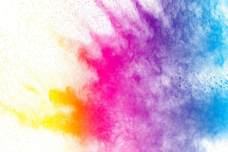Foto ontfocust beeld van veelkleurige poederverven tegen een witte achtergrond