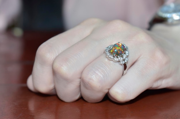 Opal An opal ring in a girl's finger