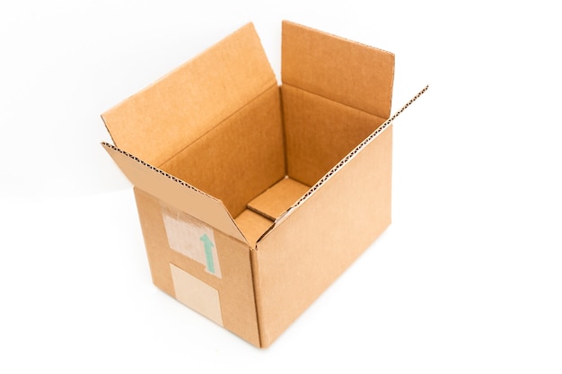 Photo open big empty brown square cardboard box for transporting goods on white background,