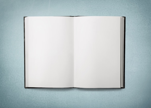 Open blank book on background