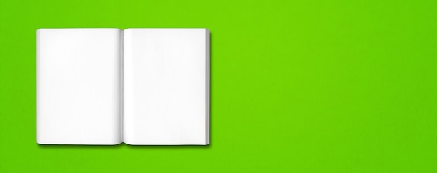 Photo open book isolated on green