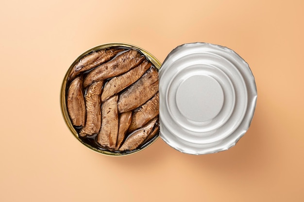 Open canned food with sprats small sea fish in oil