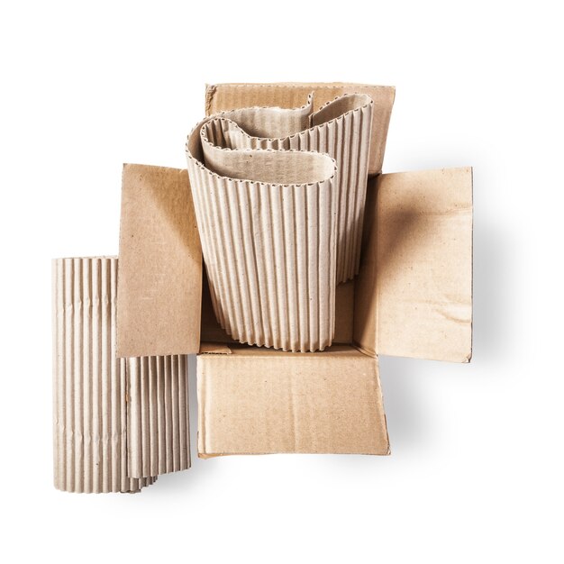 Open cardboard box and corrugated role Packaging material Objects isolated on white background