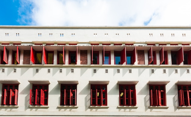 Open colorful window shutters in Chinatown district of Singapore, Asia