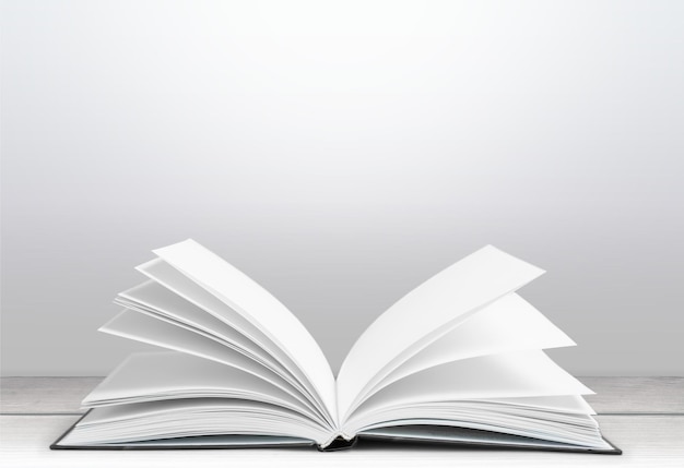 open empty notebook on wooden table