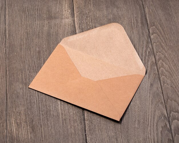 Open Envelope on a wooden background