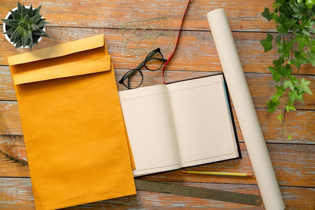 An open lined notebook on a marble table with gray paper Mockup with space for text Desk seen from