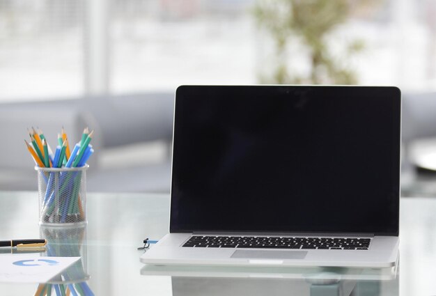 Open notebook and pencil box on the businessman's Desk