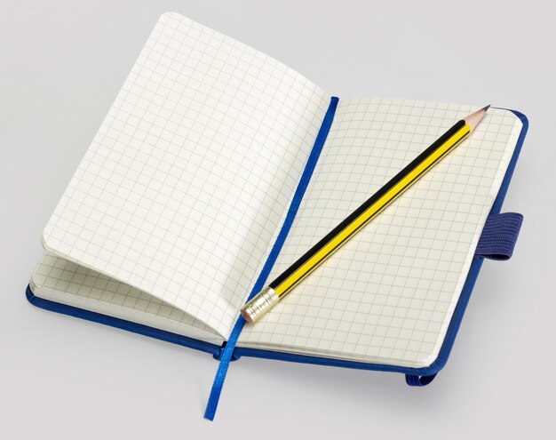 open notebook and pencil