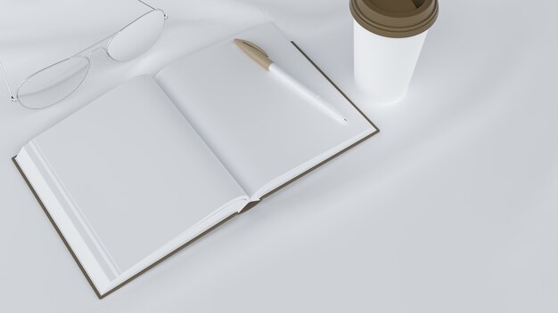 An open notebook with pens glasses and a glass of water On a table covered with white cloth