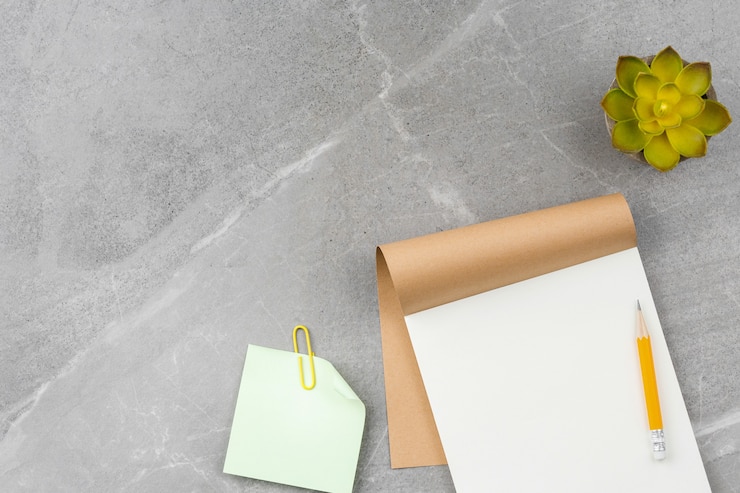 Photo open notepad on gray marble background