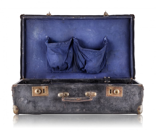 Open old suitcase with blue upholstery inside