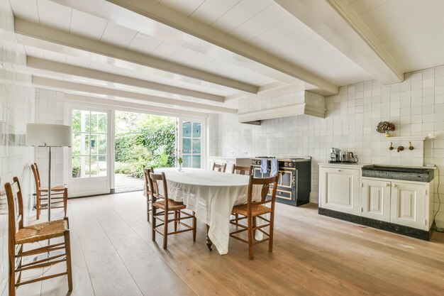 Open plan spacious kitchen with ceiling beams