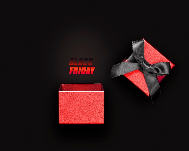 open red box with the inscription black friday on a black background