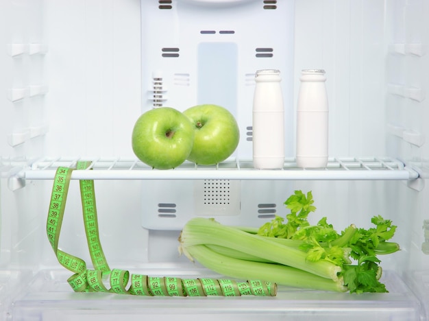 Open refrigerator with diet food