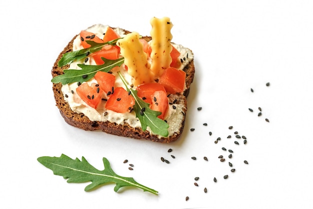 Open rye bread sandwich isolated on white background