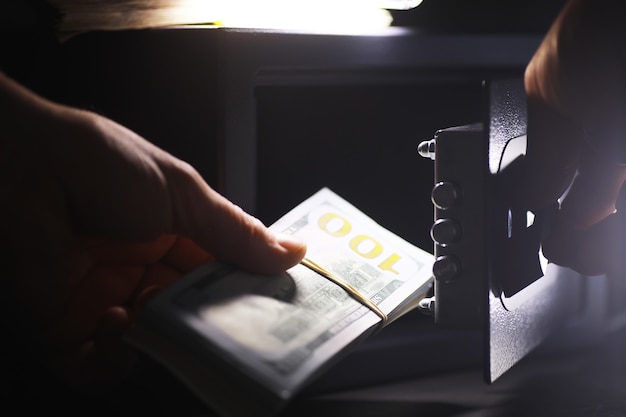 Open safe in a wealthy house. Safety box in hotel room. Concept safe storage of money and documents