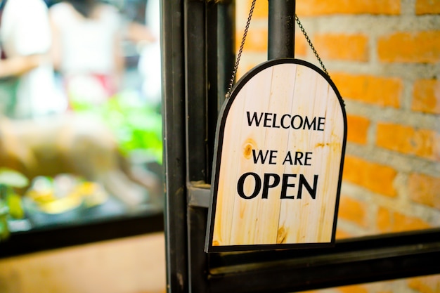 Photo open sign at restaurant and store