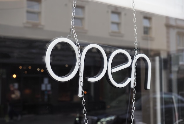 Photo open sign in shop window