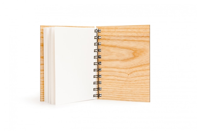 Open spiral notebook with solid wood cover isolated