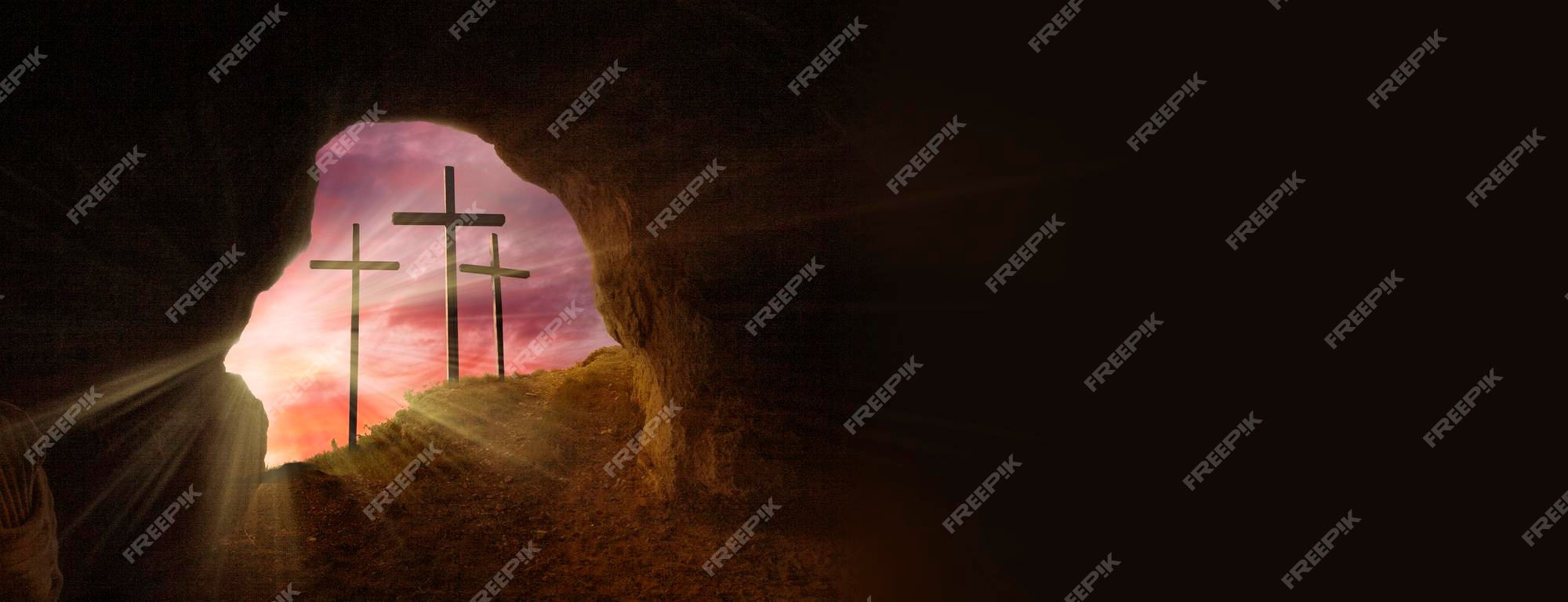 Premium Photo | Open tomb at sunrise with grave clothes and three ...