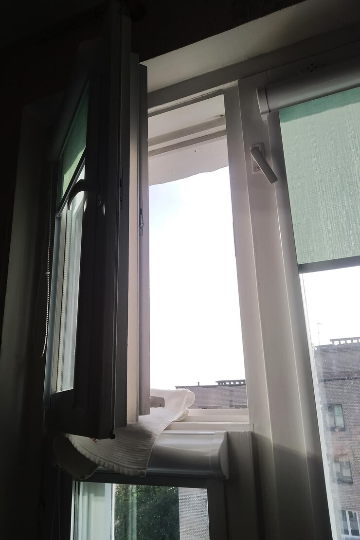 Photo open window window in the shade closeup