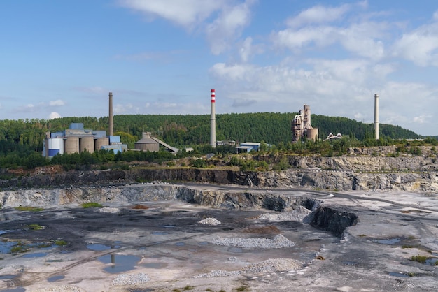 Opencast mining quarry with machinery and mining equipment Limestone mining for cement production