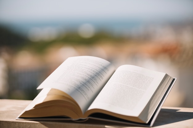 Photo opened book on ledge