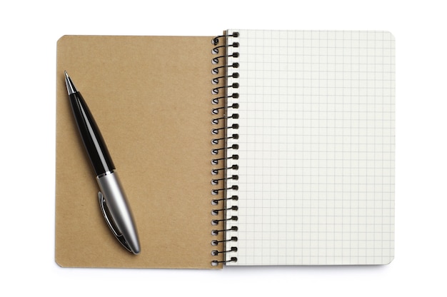 Opened notepad and pen on white background