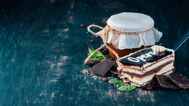 Opera Chocolate Cake On a wooden background Top view Copy space