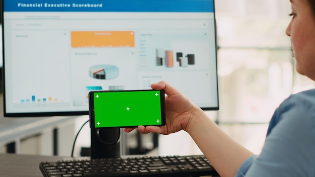operator focusing on blank mockup screen
