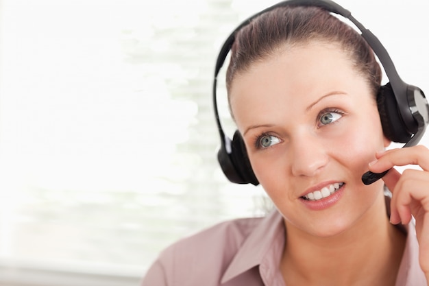 An operator with headset helping someone