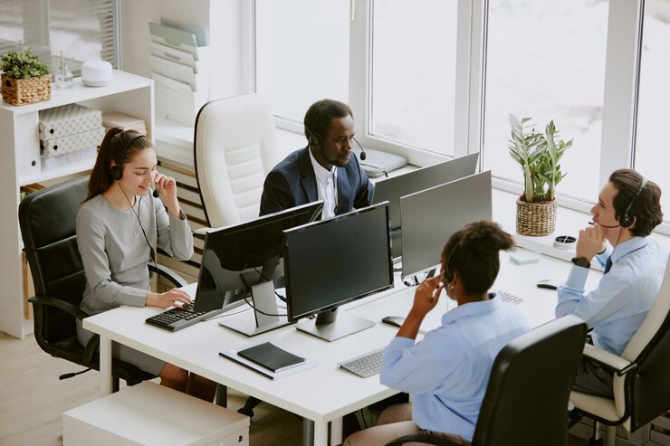 Photo operators in office at work