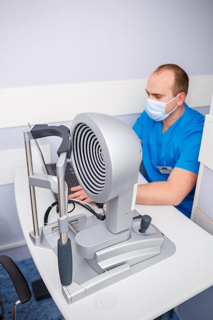 Ophthalmologist consultation in a modern new hospital. A modern doctor working with the patient's health.