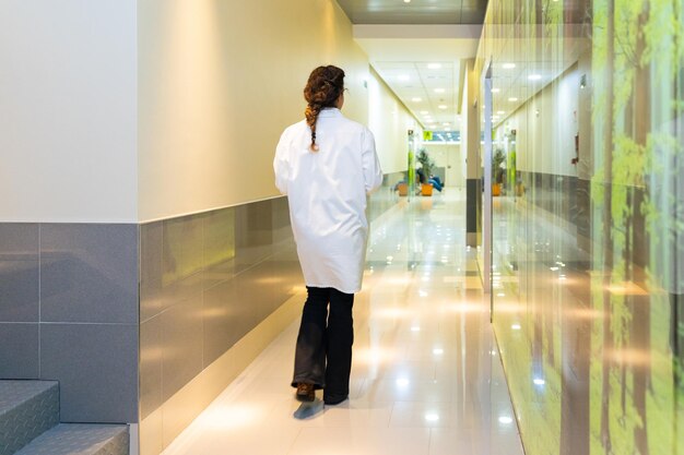 Ophthalmologist walking along a corridor in the clinic