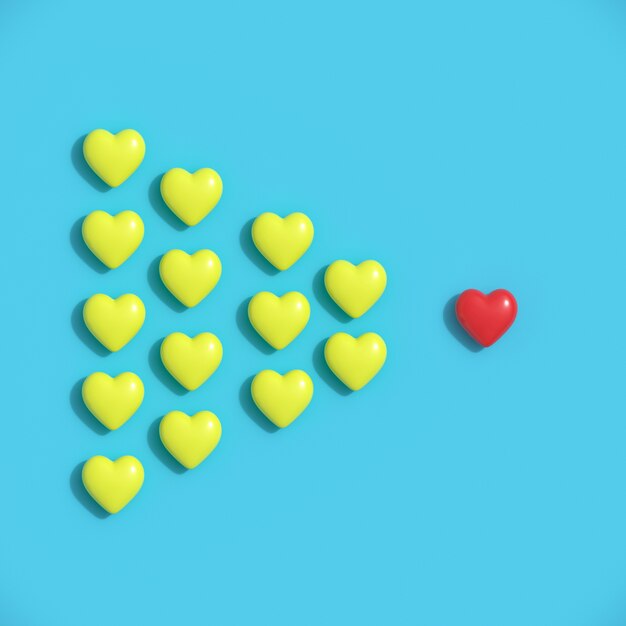 Opmerkelijke Rode hartvorm onder gele harten op blauwe pastelkleurachtergrond.
