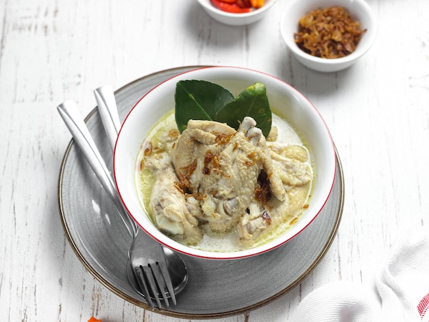 Opor ayam or chicken white curry is traditional Indonesian culinary food