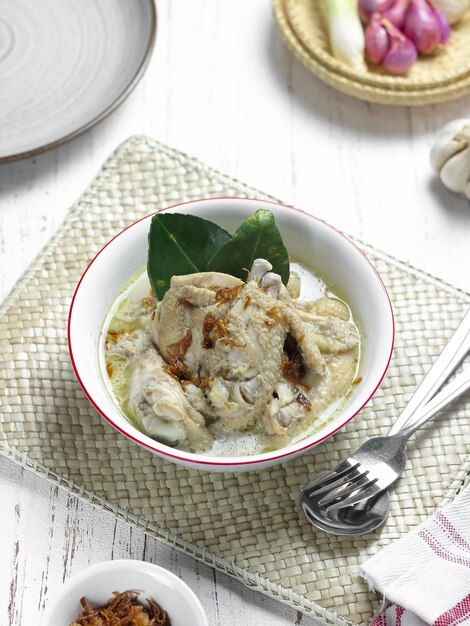 Opor ayam or chicken white curry is traditional Indonesian culinary food